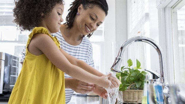 Family washing their hands