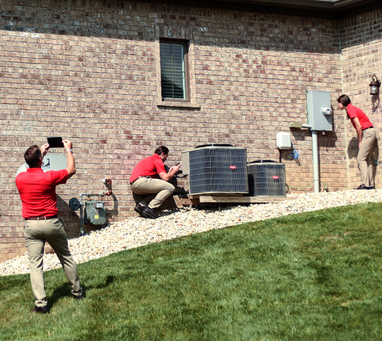 Home Inspectors working on house